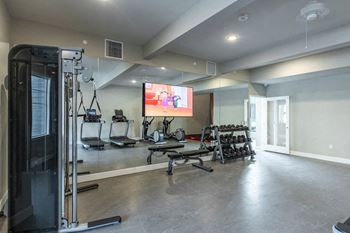 24-Hour fitness center with rock climbing wall
