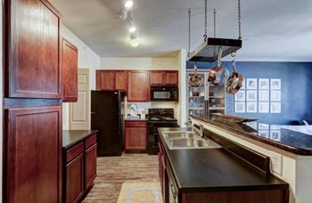 Gourmet kitchens featuring granite island countertops