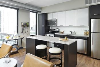 Custom kitchens with espresso cabinets or duotone cabinetry