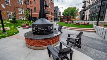 Indoor and outdoor rooftop fireside lounge