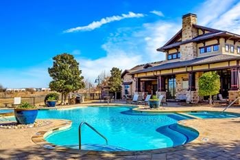 Resort-style lagoon and lap pools with water features