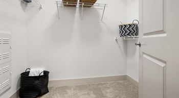 Roomy walk-in closets with built-in shelving