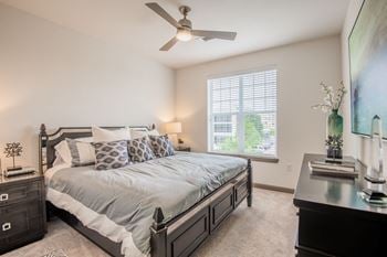 Bedrooms with ceiling fans and spacious closets