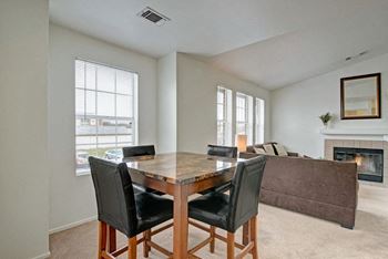St. James place dining table set with granite top
