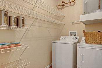 Stoneleigh spacious laundry area with washer & dryer