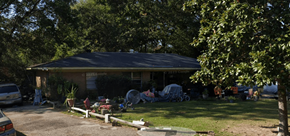 Ruston apartment for rent - a house with a yard and parked cars in front of it