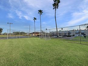 Brownsville apartment for rent - Community soccer field with goalposts at Los Cedros Apartments