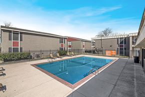 Victoria apartment for rent - Resort-style swimming pool with lounge seating at Sage Creek Apartment