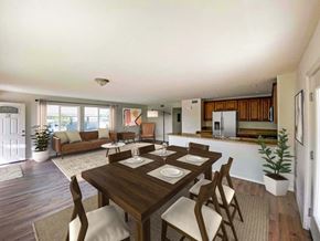 San Bernardino apartment for rent - A dining room with a wooden table and chairs.