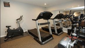Rialto apartment for rent - a treadmill and other exercise equipment in a gym