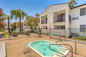 San Bernardino apartment for rent - our apartments have a resort style pool and a building with palm trees