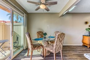Upland apartment for rent - A patio with a table and chairs is shown.
