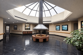 Danville apartment for rent - A large atrium with a black tiled floor and a glass roof.