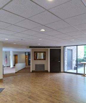 Springfield apartment for rent - a large room with a wood floor and a large window