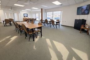 Danville apartment for rent - A conference room with a long table and chairs.