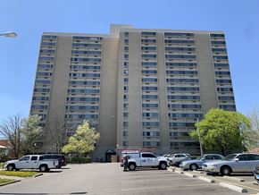 Springfield apartment for rent - a parking lot in front of an apartment building