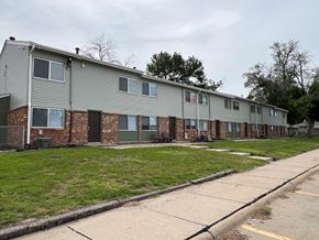 Council Bluffs apartment for rent - an image of an apartment building with a sidewalk