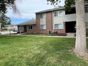 Council Bluffs apartment for rent - a view of the exterior of a brick apartment building
