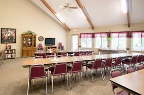 Harlan apartment for rent - a large room with tables and chairs