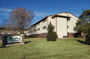Des Moines apartment for rent - A building with a sign that says Southridge Senior Residents in front of it.