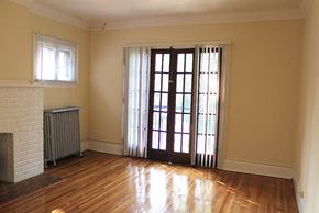 Cleveland Heights apartment for rent - a living room with a wood floor and a glass door