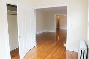 Cleveland Heights apartment for rent - an empty living room with a wood floor and a closet