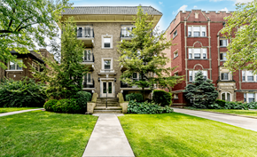 Cleveland Heights apartment for rent - A large brick building with a tree in front of it.