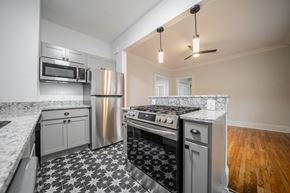 Cleveland Heights apartment for rent - A kitchen with a black and white checkered floor.at Integrity Cleveland Heights Apartments,Ohio, 44106