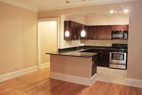 Cleveland Heights apartment for rent - an empty kitchen with a counter top and