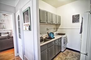 Cleveland apartment for rent - a small kitchen with stainless steel appliances and a sink