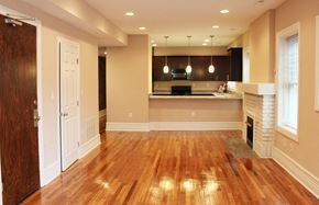 Cleveland Heights apartment for rent - an empty living room and kitchen with wood floors