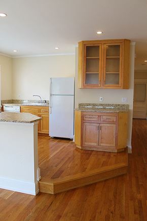 Cleveland Heights apartment for rent - a kitchen with wooden floors and a white refrigerator