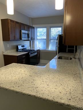Cleveland Heights apartment for rent - an empty kitchen with a granite counter top