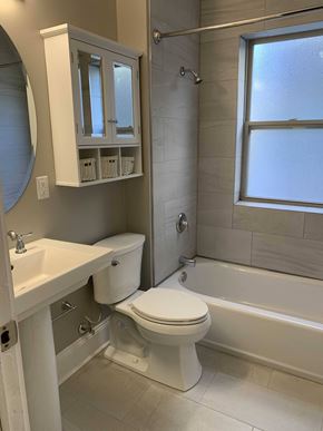 Cleveland Heights apartment for rent - a bathroom with a toilet and a tub and a sink