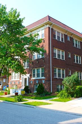 Cleveland Heights apartment for rent - a red brick building with a street in front of it