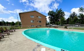 Northfield apartment for rent - the swimming pool at our community center with our building in the background