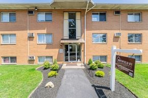 Northfield apartment for rent - The image shows the front of a brick building with a sign that reads "Northfield B1".