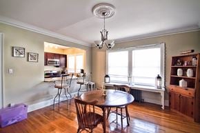 Lakewood apartment for rent - a living room with a dining room table and a kitchen