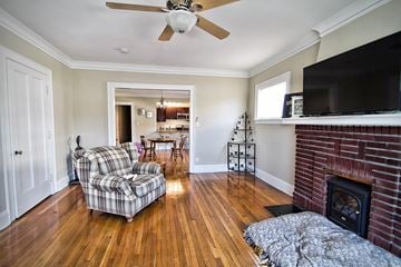 Lakewood apartment for rent - a living room with a fireplace and a couch and a tv