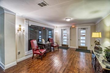 Shaker Heights apartment for rent - a living room with chairs and a desk and a window
