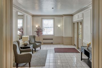 Cleveland apartment for rent - a living room with chairs and a table
