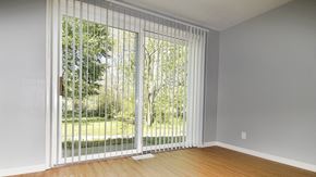 Olmsted Falls apartment for rent - A room with a sliding glass door leading to a garden.
