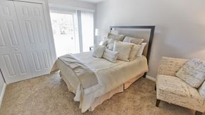 Cleveland apartment for rent - Townhome bedroom with large closet and patio access.