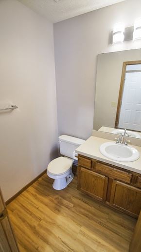 Wadsworth townhouse for rent - a small bathroom with a toilet sink and mirror