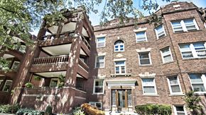 Cleveland Heights apartment for rent - the apartment building has a brick facade and a balcony