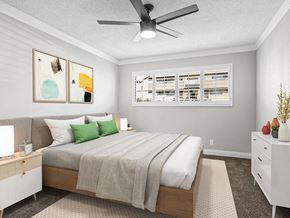 Los Angeles apartment for rent - Carpeted bedroom with ceiling fan.