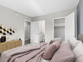 Studio City apartment for rent - Carpeted bedroom with view of private closet and hall.