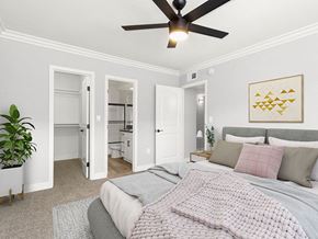 Valley Glen apartment for rent - Carpeted bedroom with ceiling fan and private bathroom.