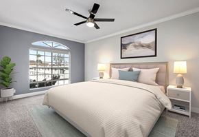 Encino apartment for rent - Carpeted bedroom featuring beautiful natural lighting and ceiling fan.