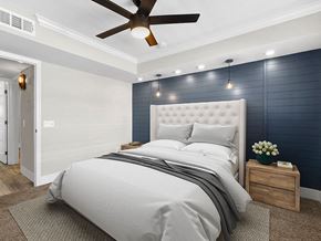 Studio City apartment for rent - Carpeted bedroom with ceiling fan and textured shiplap accent wall.